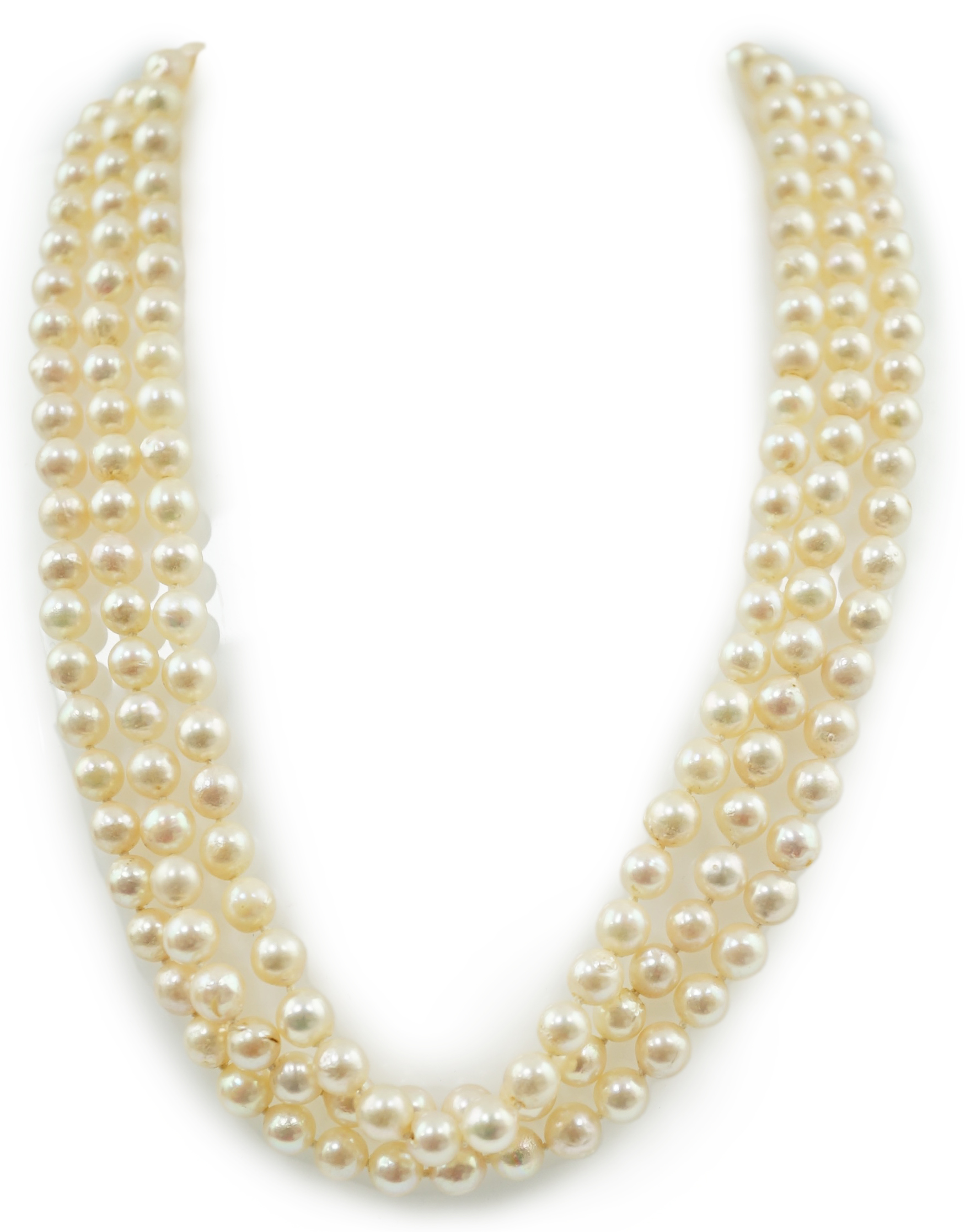 A modern triple strand cultured pearl choker necklace, with three stone diamond set 14k white gold clasp